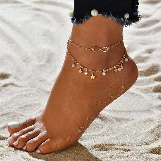 INFINITY ANKLET WITH PEARL AND STAR CHARMS